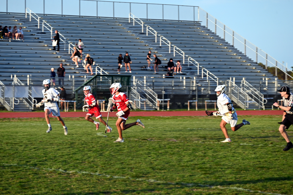 Kids play lacrosse